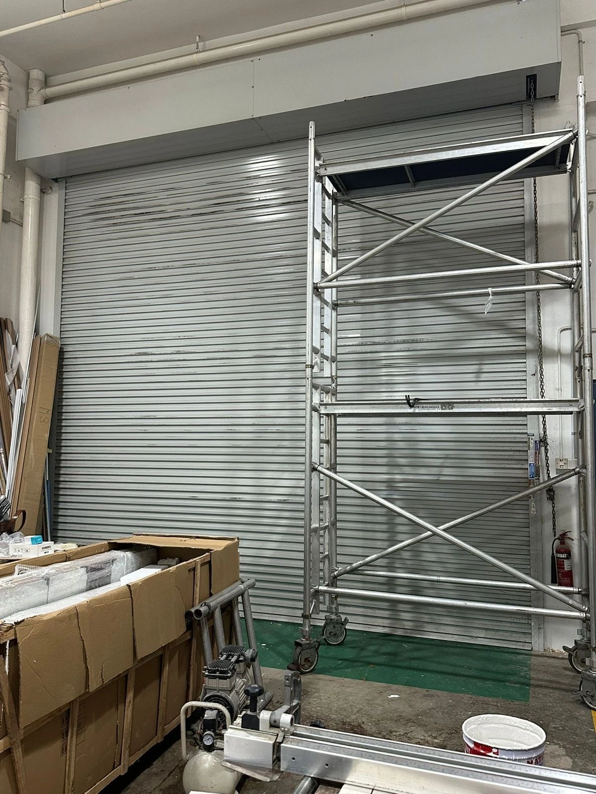 Shop roller shutter repair service in Singapore for stuck or damaged shutter doors